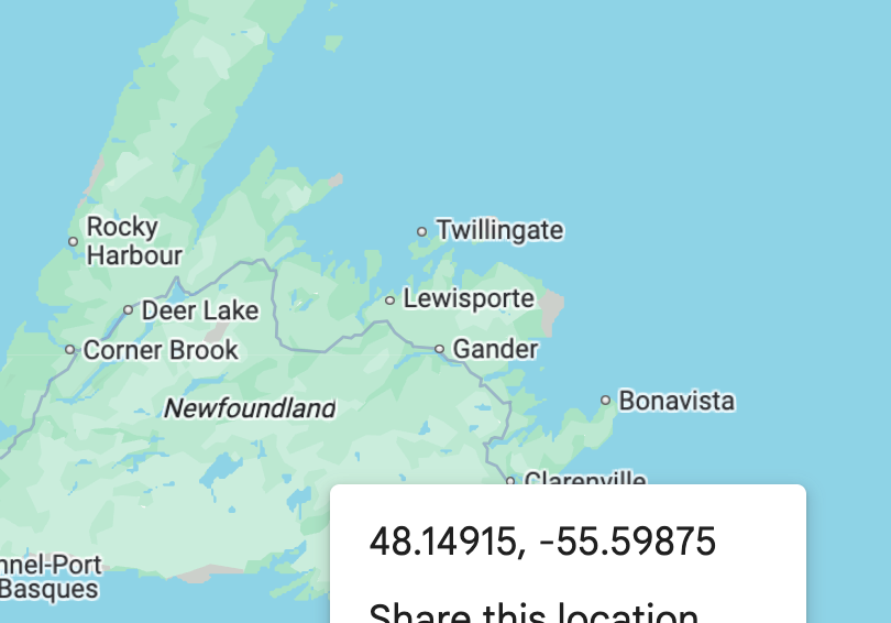 Screenshot of map of Newfoundland, with a white overlay containing its latitude and longitude.