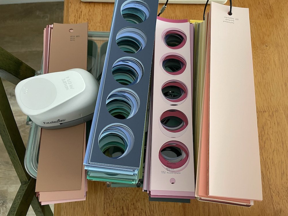 Photo of remainder of paint swatches, after circles were cut out