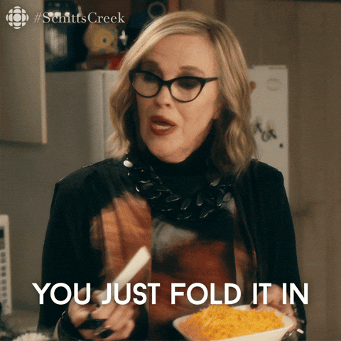 Gif of Moira from Schitt’s Creek saying to “just” fold in the cheese
