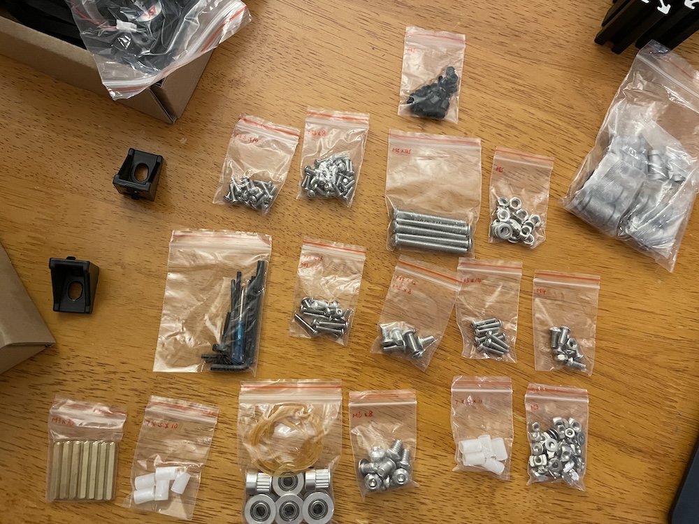 Photo of rows of baggies of different screw sizes.