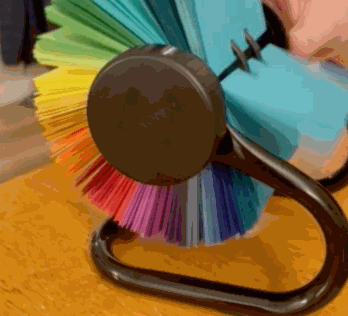 Animated gif of photos of empty rainbow Musidex with no content