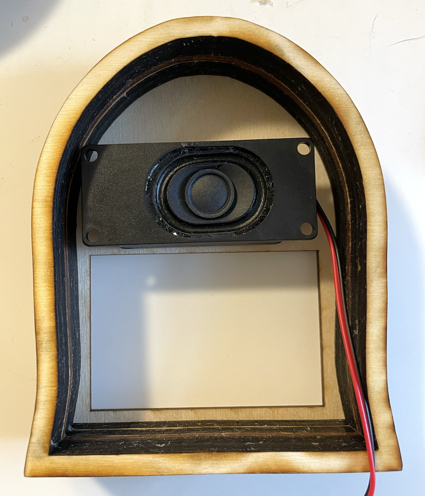 Photo of speaker, velcroed.