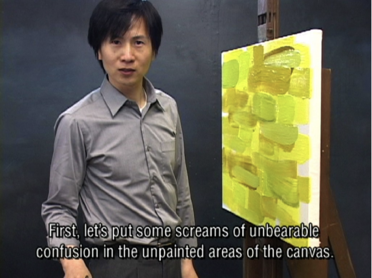 Screenshot of artist in front of yellow-painted canvas with caption “First let’s put some screams of unbearable confusion in the unpainted areas of the canvas”